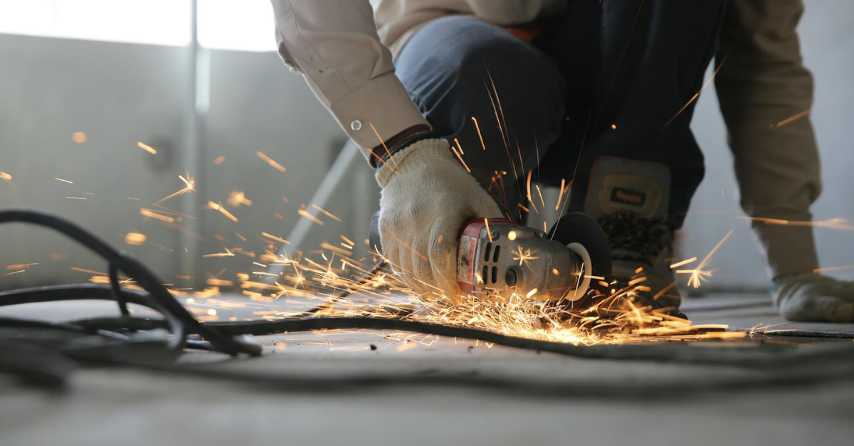 man using circular cutting tool