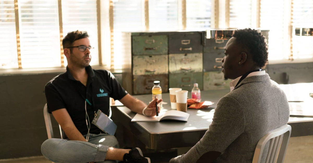 employees discussing unemployment benefits