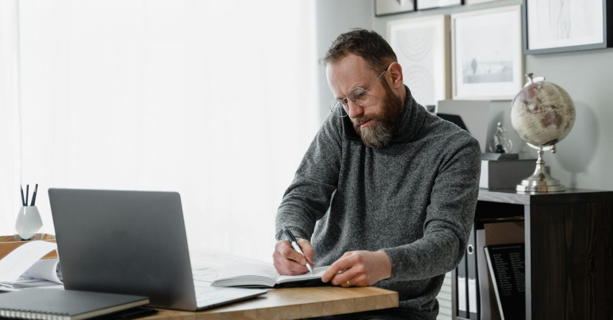 business owner comparing payroll services