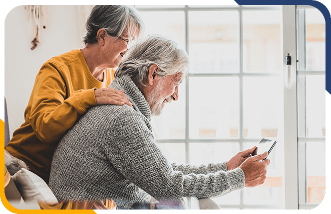 Retired couple looking at a tablet