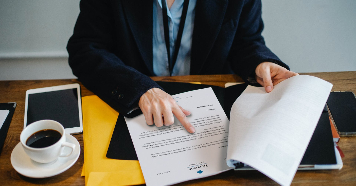 Business person reviewing document