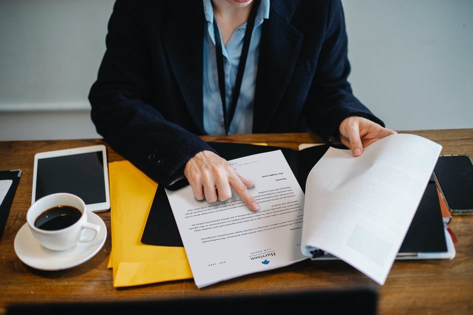 Business person reviewing document