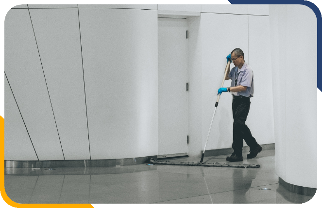 janitor sweeping floor